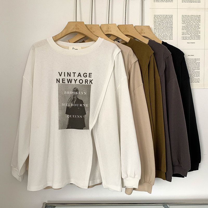 Design sense split long-sleeved American sweater chic Hong Kong style autumn 2022 new Korean version loose casual top women