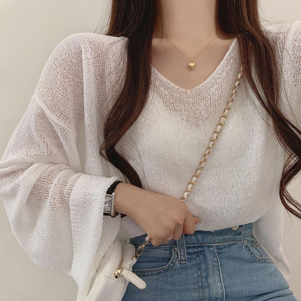 Knitted air-conditioned shirt women's thin section 2022 sun protection clothing design sense ins backless tie loose long-sleeved v-neck top