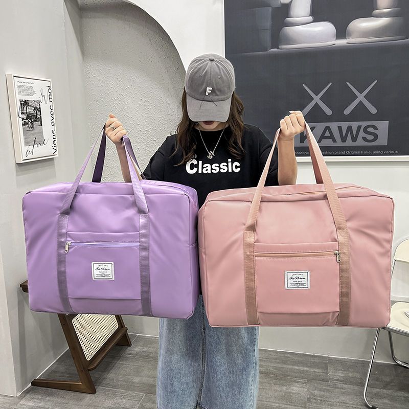 Multifunctional travel bag large capacity waterproof luggage bag storage bag finishing clothes packing bag female boarding bag