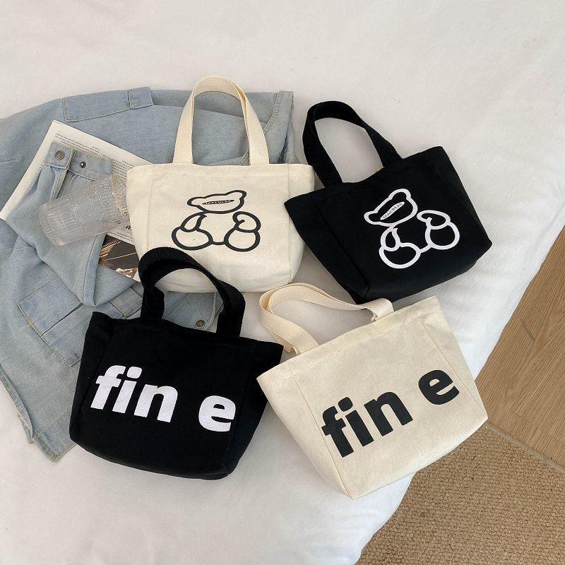 Bag women's Korean version of the small tote bag 2022 new canvas cosmetic bag to go out to the simple and versatile mother bag