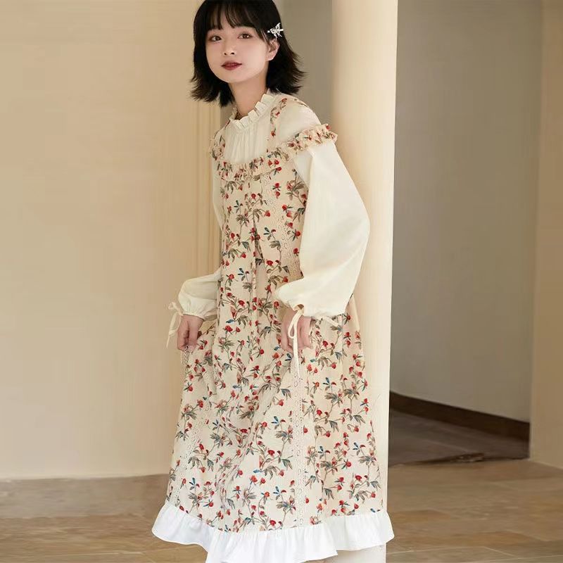 2022 early spring age reduction leave two-piece printed dress women's loose and sweet stitching ruffled long-sleeved midi skirt
