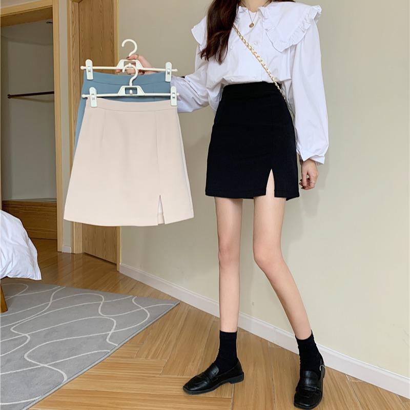 Korean version chic temperament a-line skirt women's summer thin section design sense of self-cultivation slit short section hip skirt small black skirt