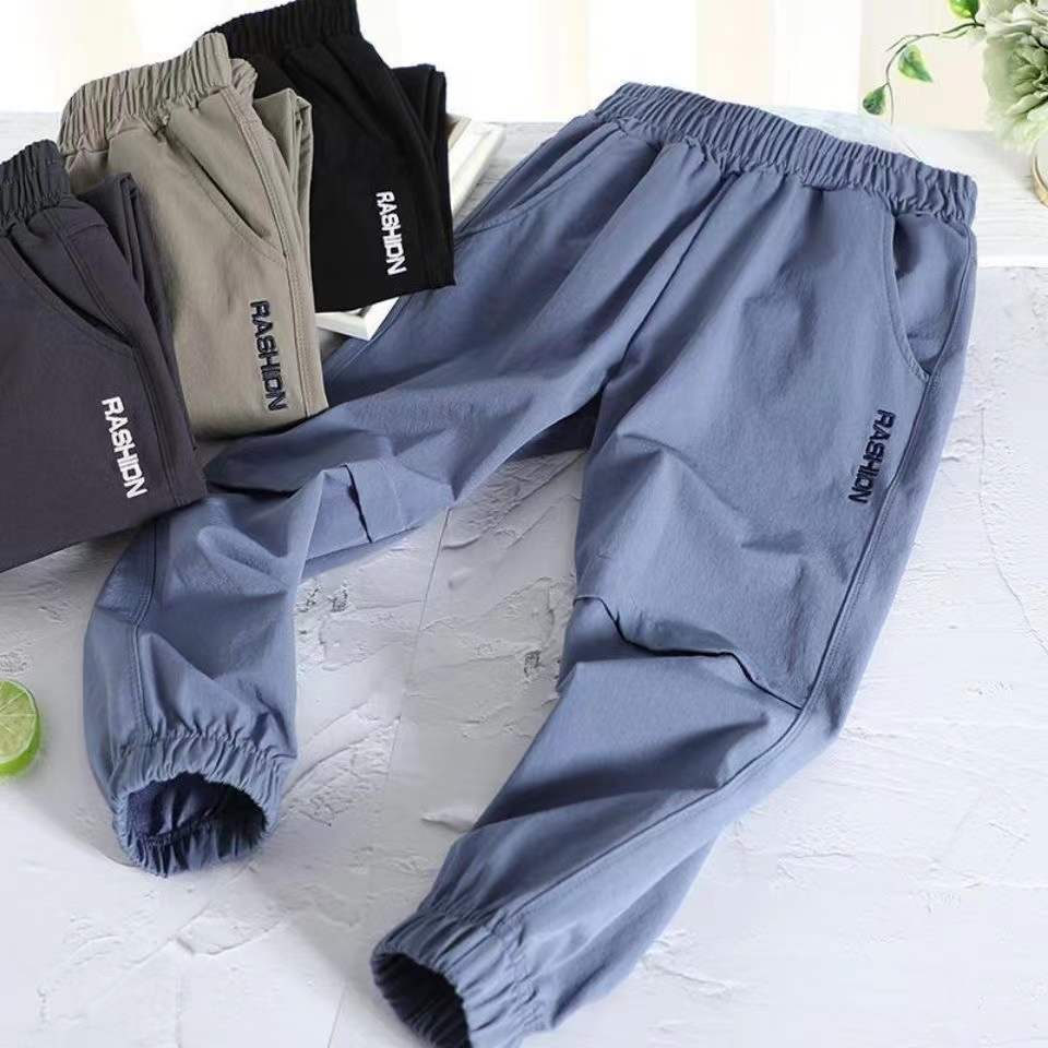 Boys' quick-drying sports pants summer pants 2022 new style big children's four-sided elastic anti-mosquito pants loose version