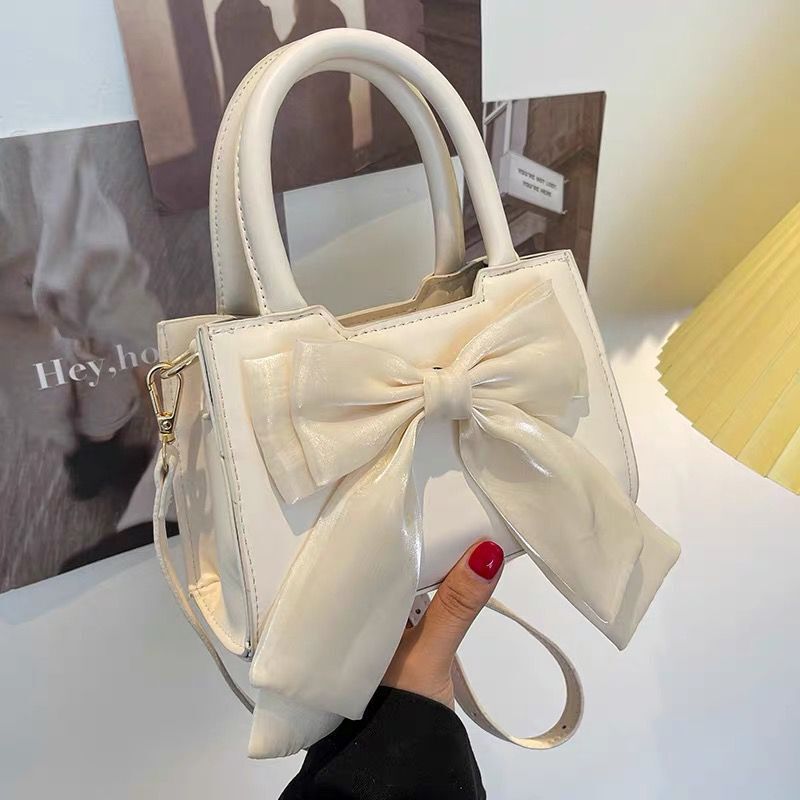 Japanese and Korean handbag women's 2022 summer sweetheart girl series sweet bow trend commuting handbag 454374