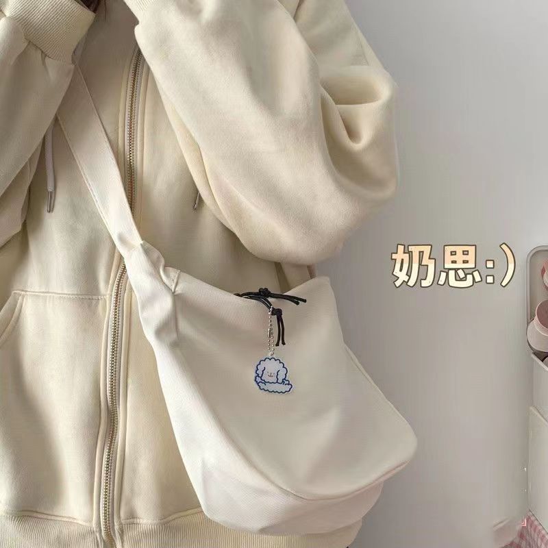 Korean version of the all-match student daily casual messenger bag Japanese Harajuku simple waffle shoulder bag diagonal dumpling bag