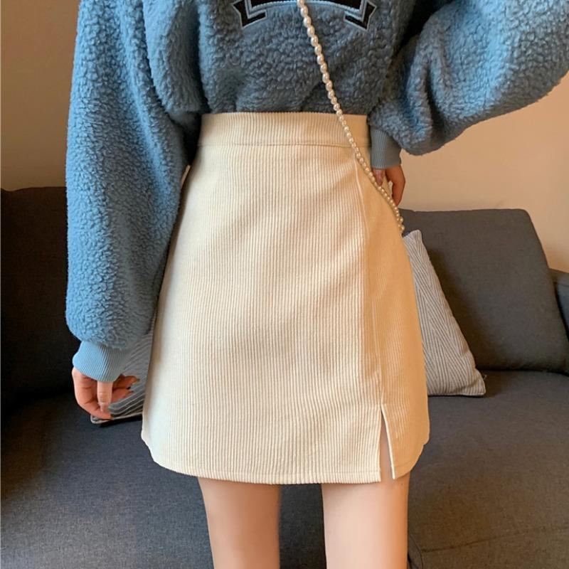 Corduroy slit skirt women 2022 spring new high waist anti-light short skirt slim A-line skirt bag hip skirt