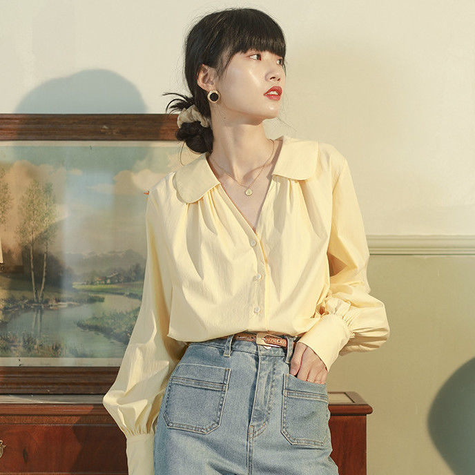 Spring and Autumn New Lantern Sleeve Doll Collar Shirt Women's French Design Sense Small Retro Temperament Clavicle Top Trendy