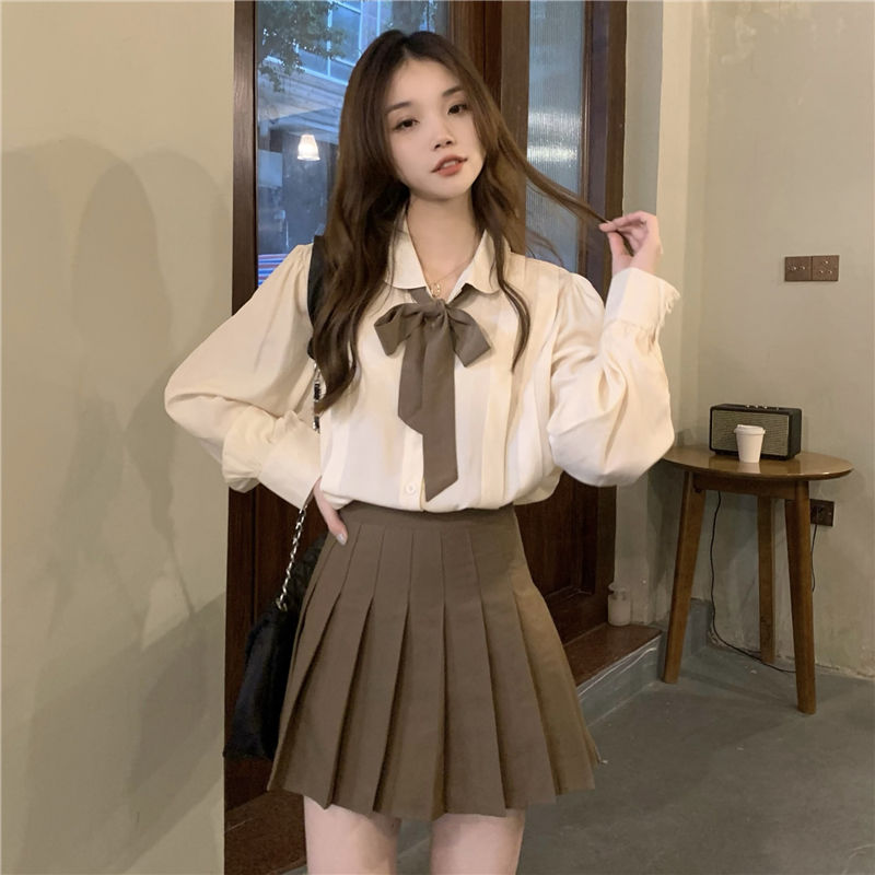 College style fashion suit women's spring and autumn 2022 new design sense shirt pleated skirt small two-piece trendy