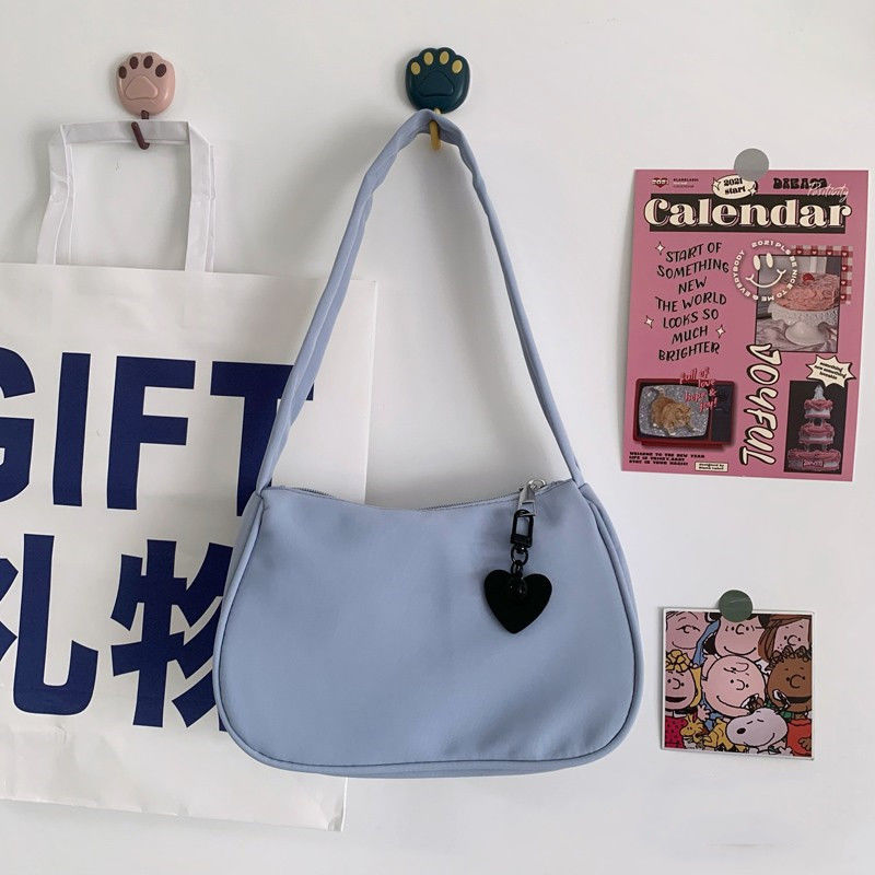 Niche high-end solid color simple shoulder bag summer commuting texture ins Korean version of female nylon street photography armpit bag