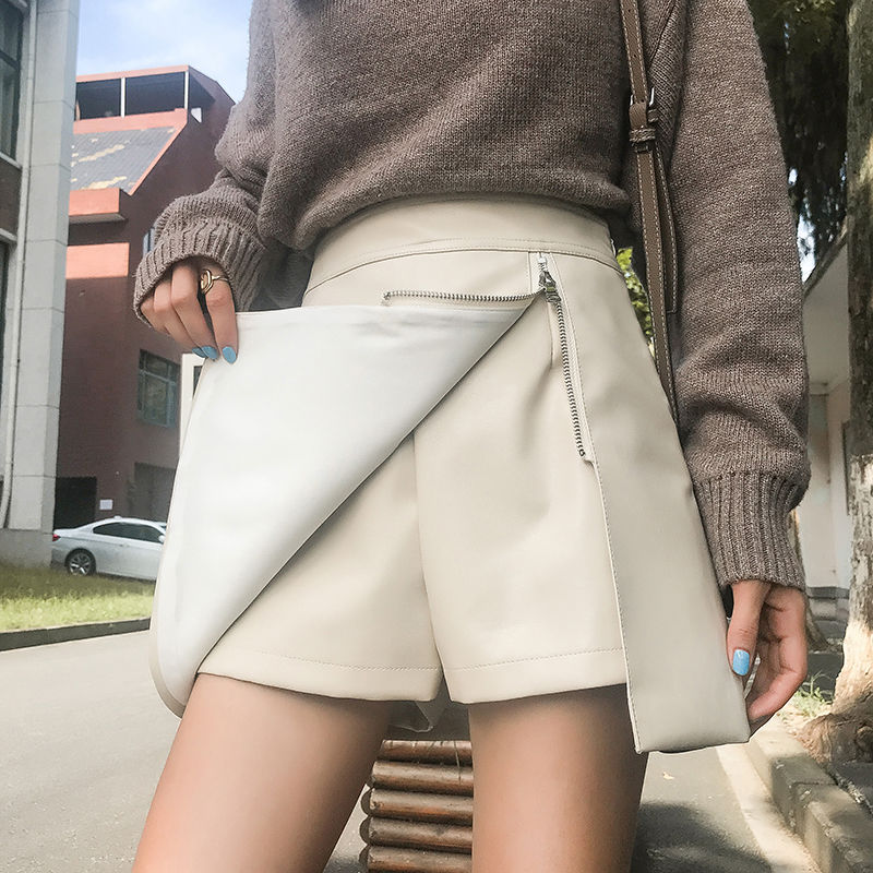 Irregular hip-packed PU leather skirt women's autumn and winter high waist slimming side zipper anti-light a-line half-length skirt