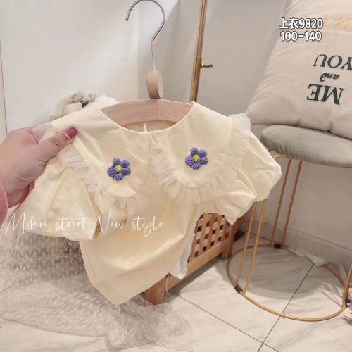 2022 summer new girl's solid color top girl baby sweet three-dimensional flower doll collar casual short-sleeved T-shirt.