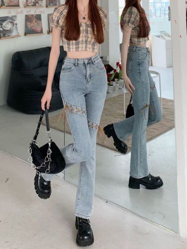 Real shot at real price Light-colored denim slim high-waisted denim trousers with strap design