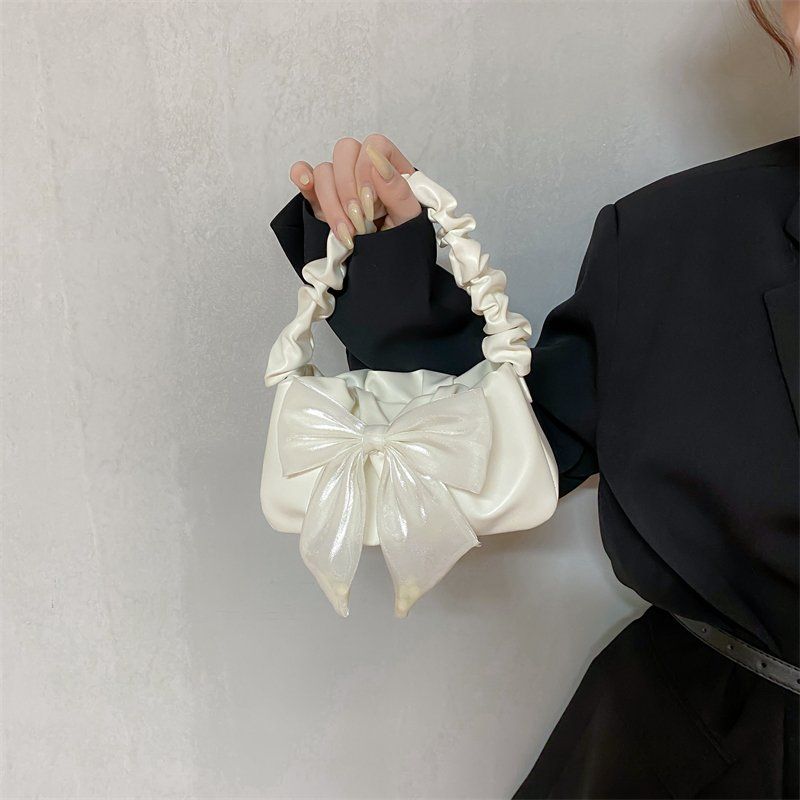 Bow decoration small bag fashion sweet style pleated portable shoulder bag simple temperament Messenger small bag all-match