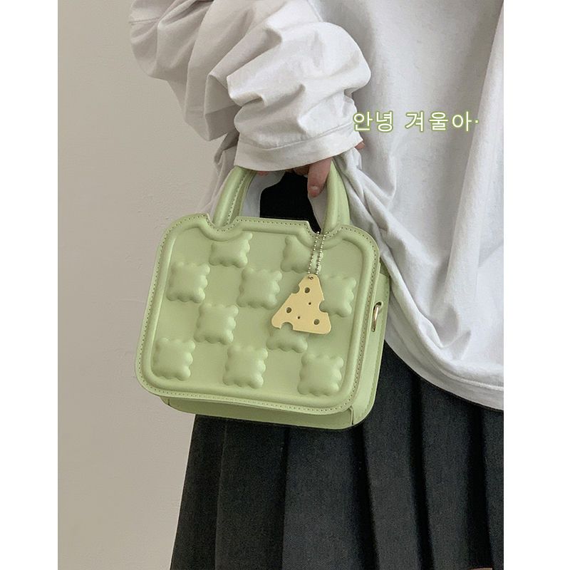 Biscuit bag female spring 2023 new trendy fashion portable small square bag niche wild ins shoulder bag Messenger bag