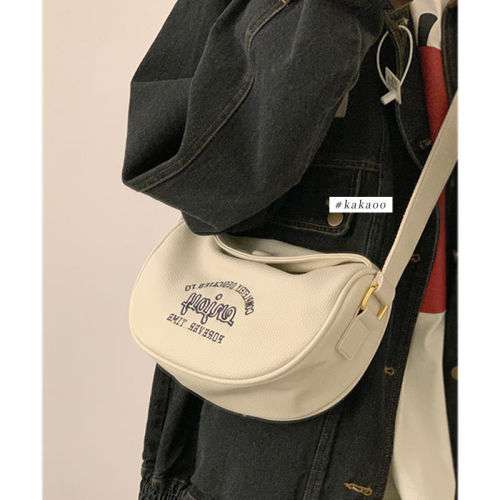 Versatile ins messenger bag female  new trendy Korean alphabet saddle bag student casual dumpling bag chest bag