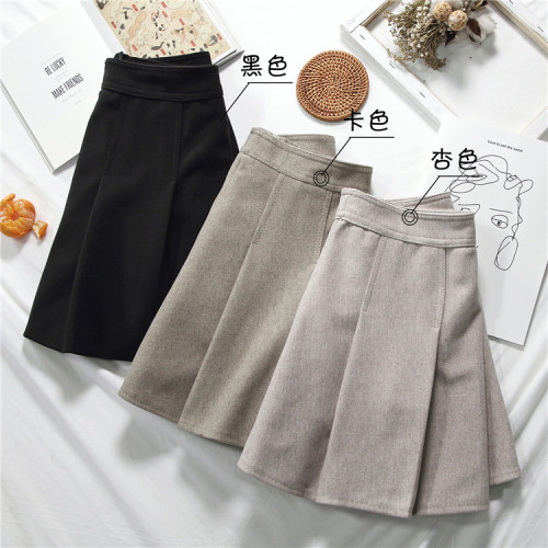 Actual shooting of the new autumn-winter Korean version of loose half-length skirt, pleated skirt, high waist A-shaped skirt and short skirt for students