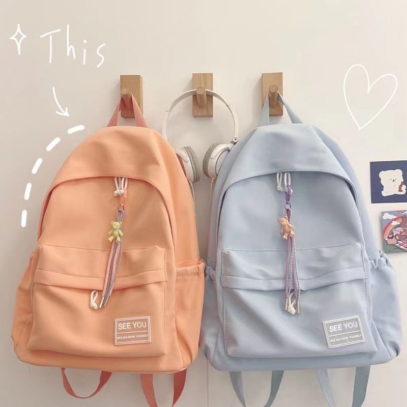 Japanese ins simple and versatile backpack female junior high school student high school college student school bag solid color large-capacity backpack female