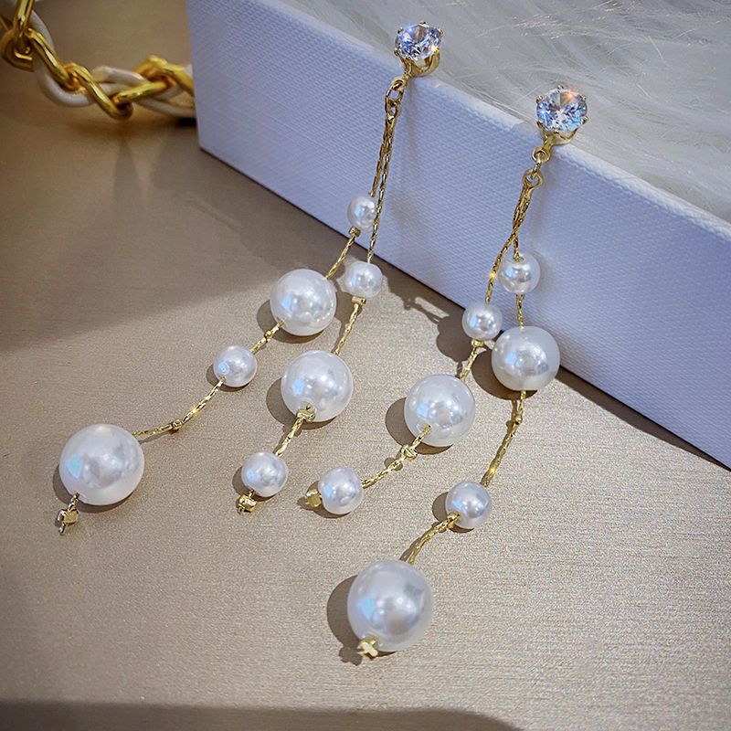 Xiaoxiangfeng pearl earrings new trendy exaggerated long tassel earrings femininity high-end atmosphere earrings round face