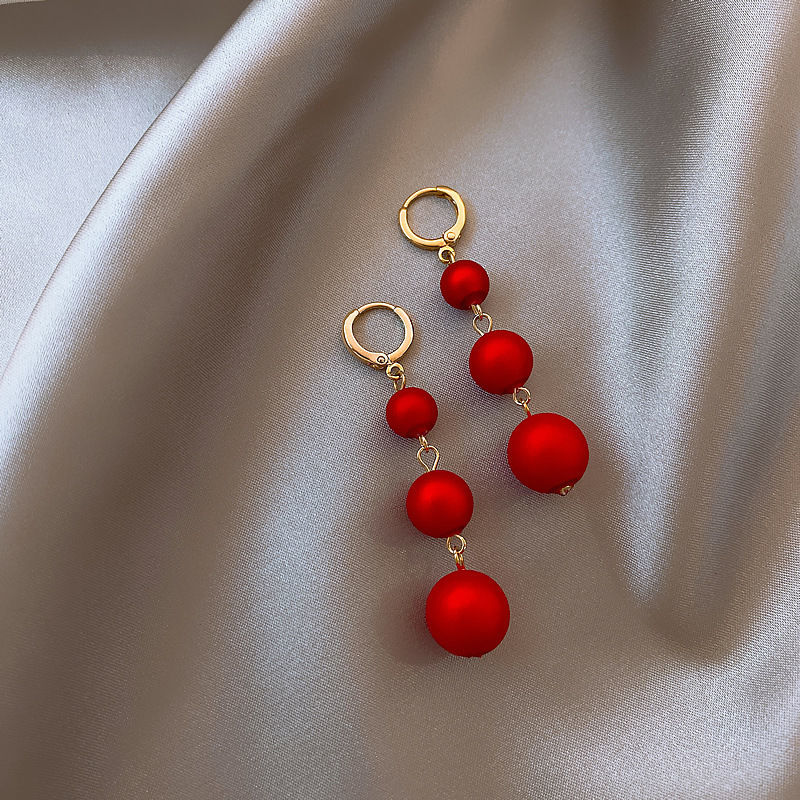 Red ball ball New Year's festive earrings female Korean temperament long tassel earrings 2020 new net red earrings