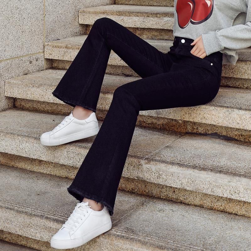 Micro flared pants women's high waist elastic jeans black long pants Korean style student slimming tassel raw edge cropped pants