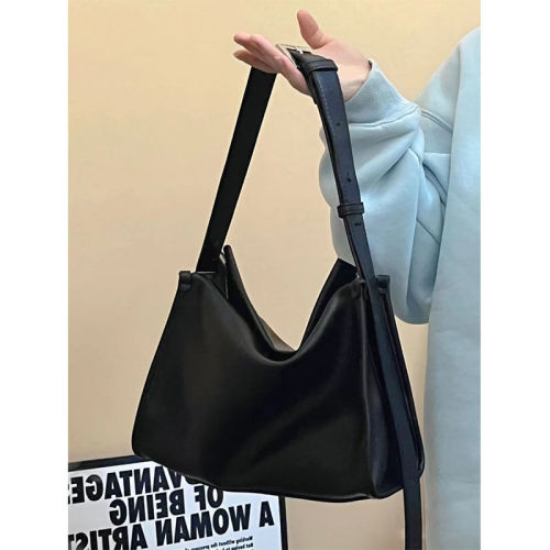Broadband messenger bag women's new niche design simple and versatile soft leather feeling commuter tote bag messenger bag