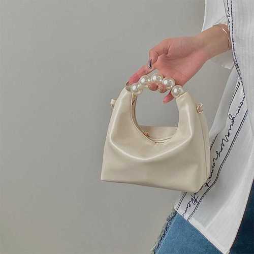 Niche design sense pearl handbag bag female 2023 new high-end sense chain Messenger bag small fresh dumpling bag