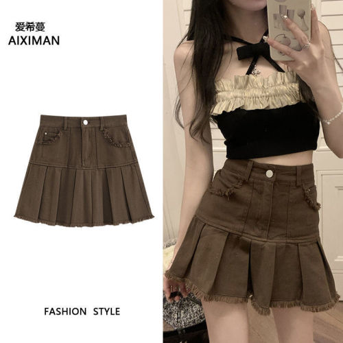 Spice girl brown denim skirt female ins summer 2023. New design sense niche raw edge pleated skirt
