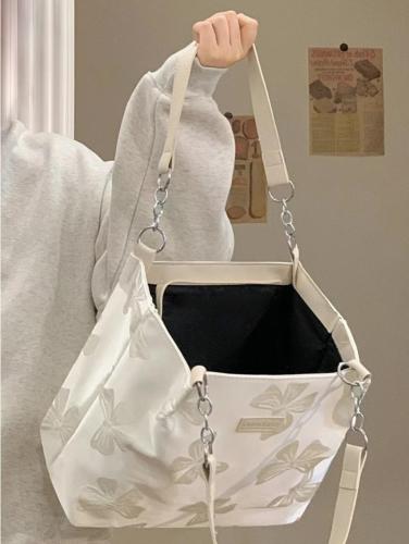Niche bowknot embroidery large capacity canvas tote bag women  new simple and versatile pearl shoulder bag
