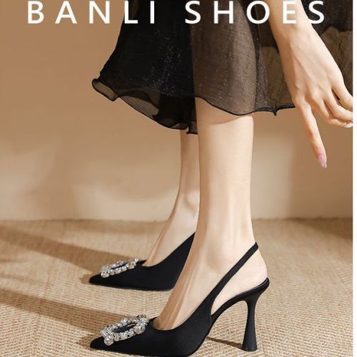 Black pointed high-heeled single shoes women's buckle rhinestone 2023 spring and autumn new side empty stiletto small ck high-heeled shoes