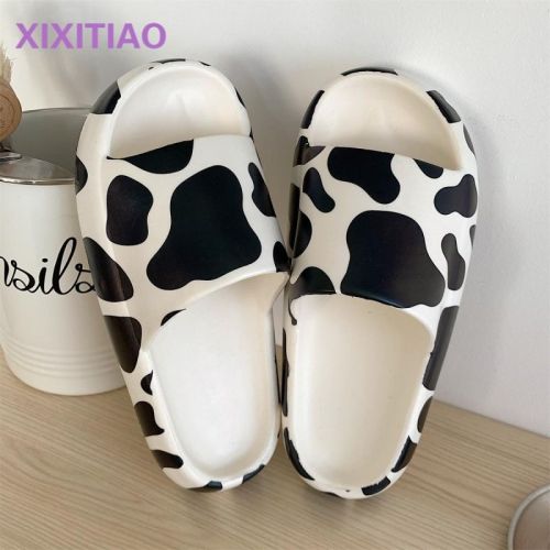 Thin strip Korean version of ins girl heart home non-slip stepping shit feeling slippers female summer students cute cow sandals and slippers
