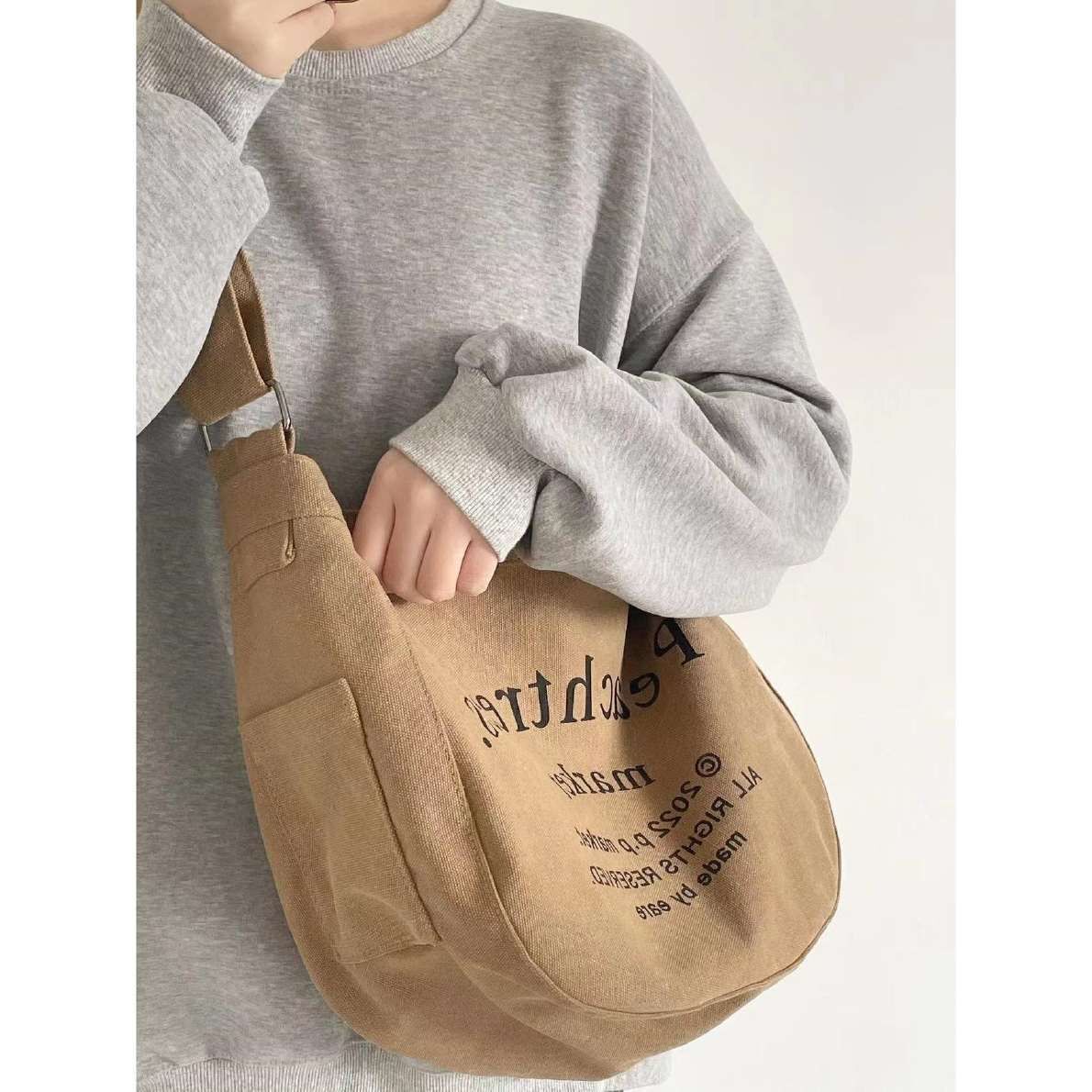 New khaki Korean version canvas bag female student letter retro Messenger bag all-match large-capacity shoulder bag