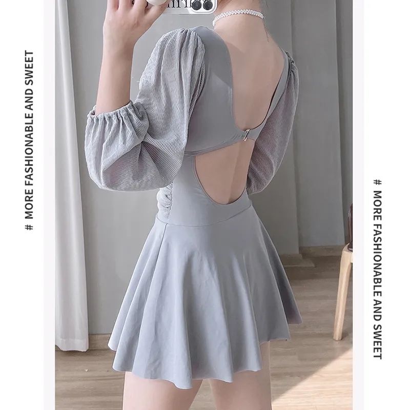 2023 new one-piece swimsuit female super fairy sexy fashion cover belly slim long-sleeved sunscreen skirt hot spring swimsuit