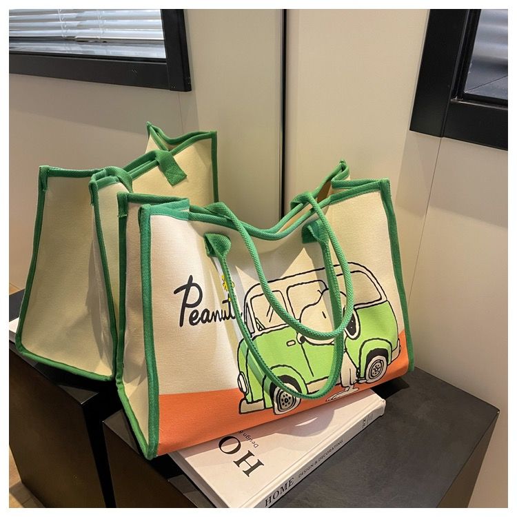 Large-capacity cartoon canvas bag female 2023 new fashion outing portable shopping bag Mommy shoulder tote bag