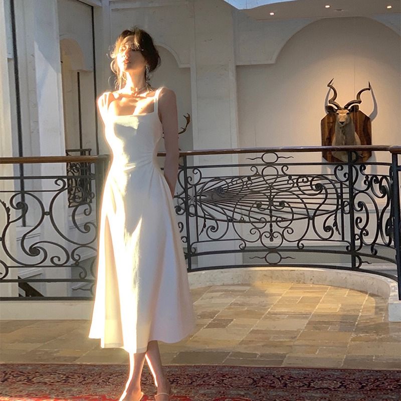 Zhao Lusi's same style white dress women's summer French high-end niche design waist a-line suspender skirt long skirt