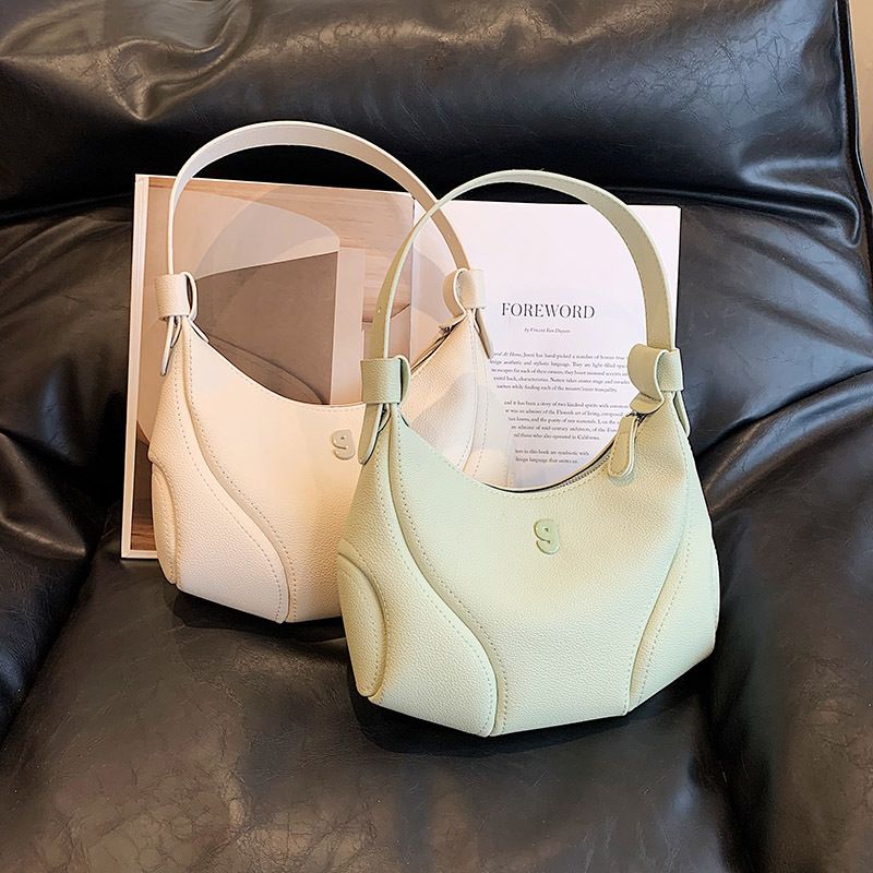 Niche design armpit bag, fashionable handheld small bag, women's popular new style this year, trendy shoulder crossbody bag
