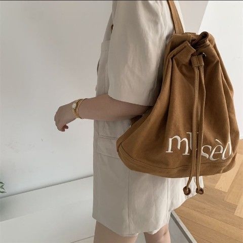 Japanese and Korean niche ins new drawstring backpack embroidered letters large capacity bucket bag travel bag tote bag