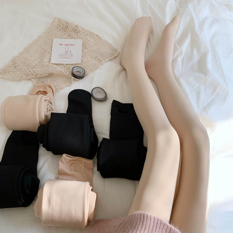 Photographed thick and warm light leg flesh-colored tights for women to wear outside in autumn and winter as base socks with feet socks