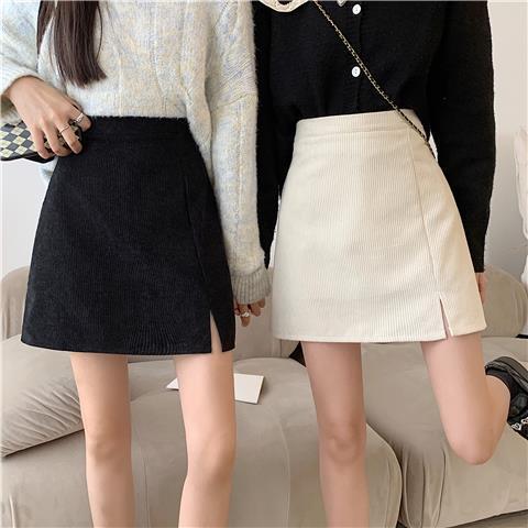 Women's skirt 2021 autumn and winter anti-exposure short skirt high-waisted retro corduroy slit A-line skirt slimming hip skirt