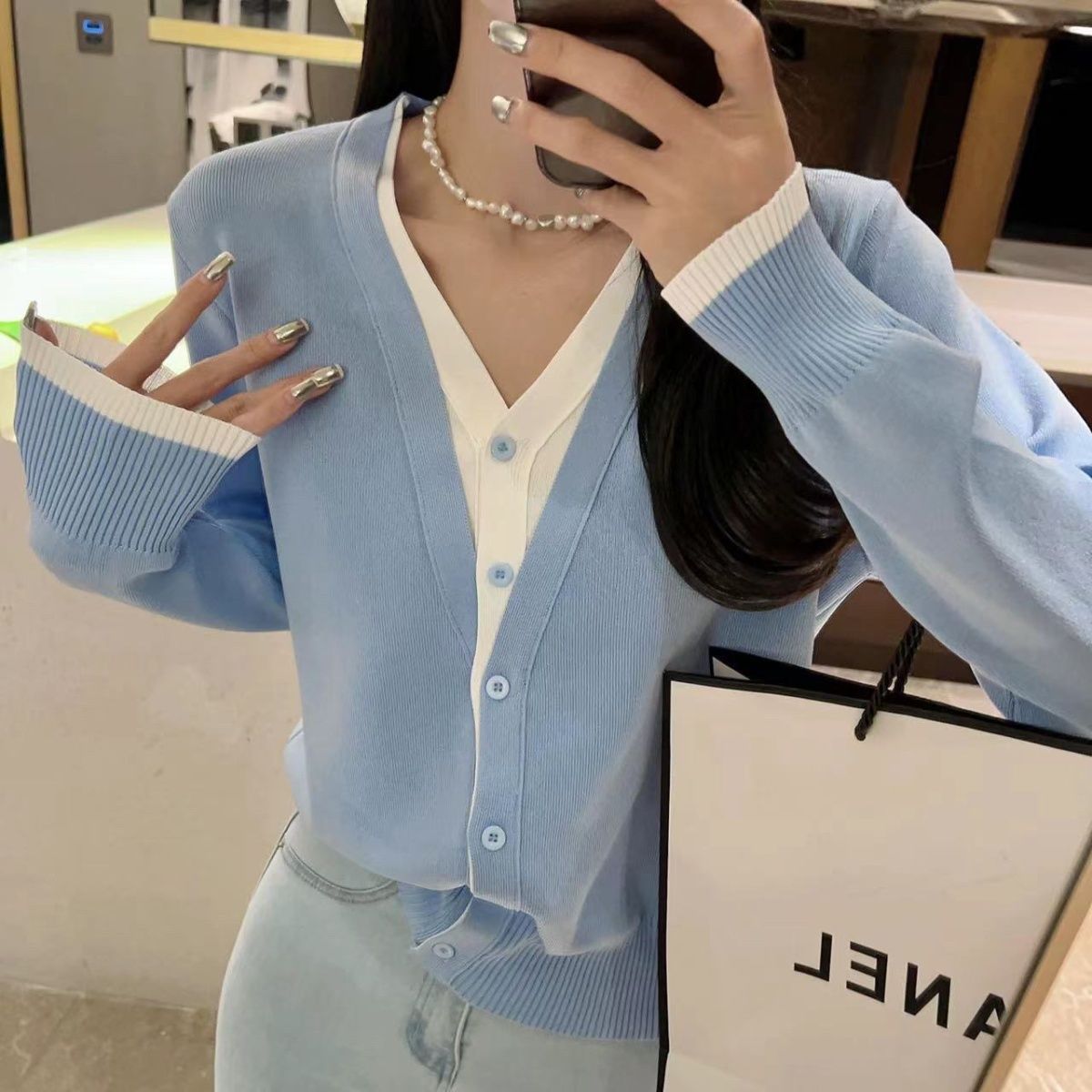 Western contrast color long-sleeved v-neck fake two-piece knitted cardigan women's thin sweater temperament 2023 early spring new top