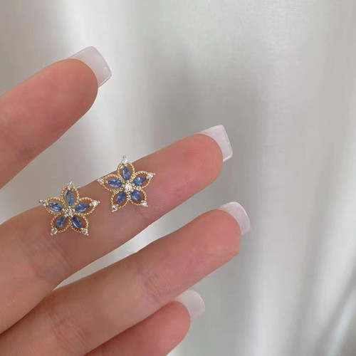 S925 sterling silver plated with 14k gold light blue orchid zircon earrings flower shape hollow versatile exquisite earrings for women