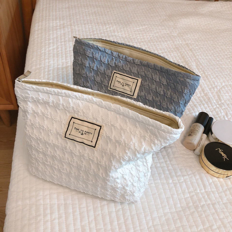 Houndstooth solid color cosmetic bag storage bag black and white temperament simple clutch bag student large capacity niche design