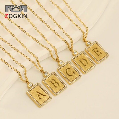 European and American INS style titanium steel sand-pressed hollow 26 English letter pendant 18K stainless steel diamond letter necklace for women