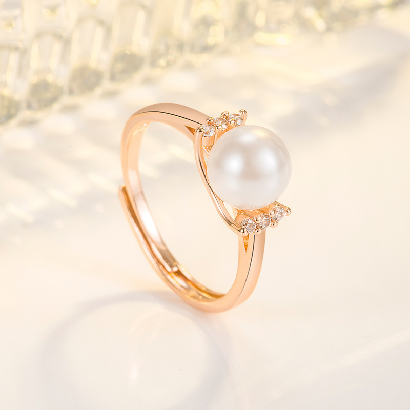Korean version of literary and artistic small clear pearl rose gold ring for women with diamond zircon pearl ring ring jewelry wholesale