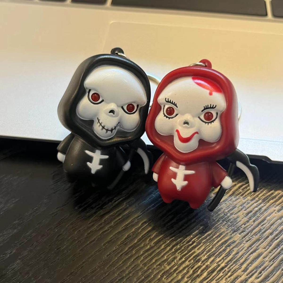 Luminous and sounding big-eyed boy keychain creative death sounding and luminous scary ghost pendant prankster small toy