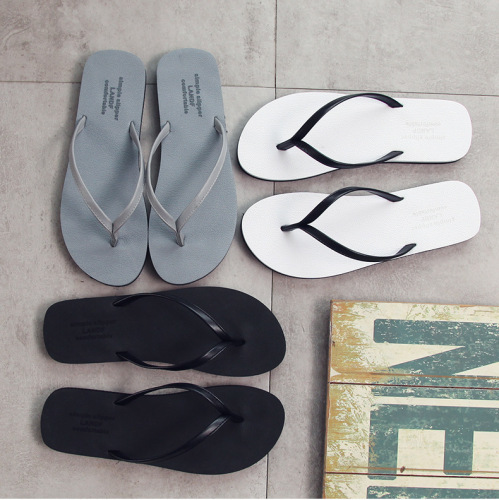 Wholesale casual couple flip-flops for women in summer simple non-slip wear-resistant flip-flops for men and flat beach shoes