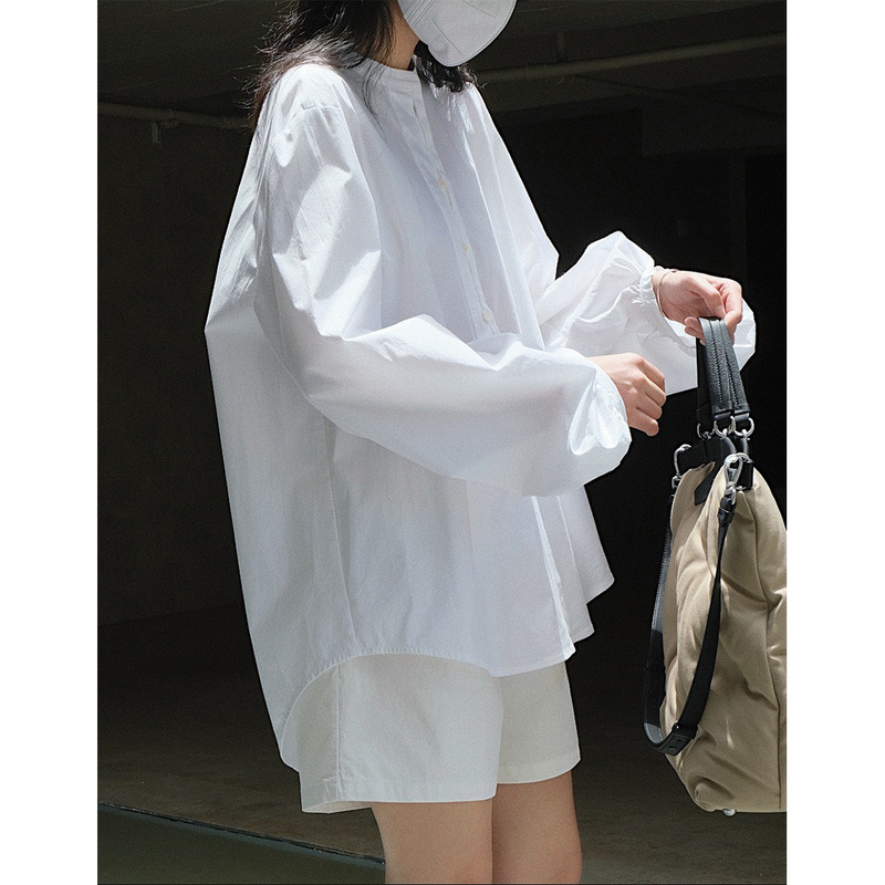 Texture recommendation: Early autumn new Korean style commuting air shirt silhouette round neck loose lantern sleeve top for women
