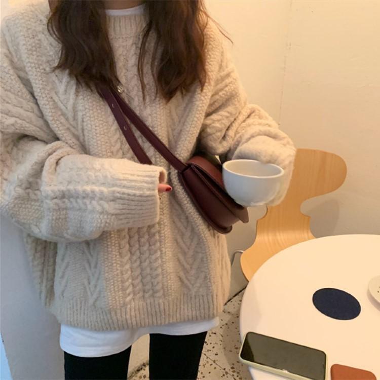 Solid color twist sweater women's design 2023 new autumn and winter retro loose long-sleeved sweater top jacket
