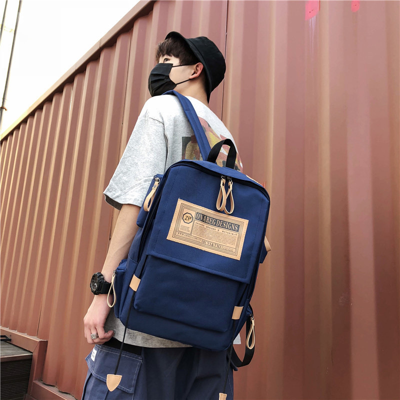 Cross-border fashion couple backpack foreign trade Korean version trendy and cool men's backpack women's wholesale foreign style lightweight student school bag