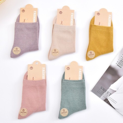 Japanese college style solid color socks for women in autumn and winter, mid-calf socks for women, versatile candy-colored cotton socks, Northeast cotton wholesale