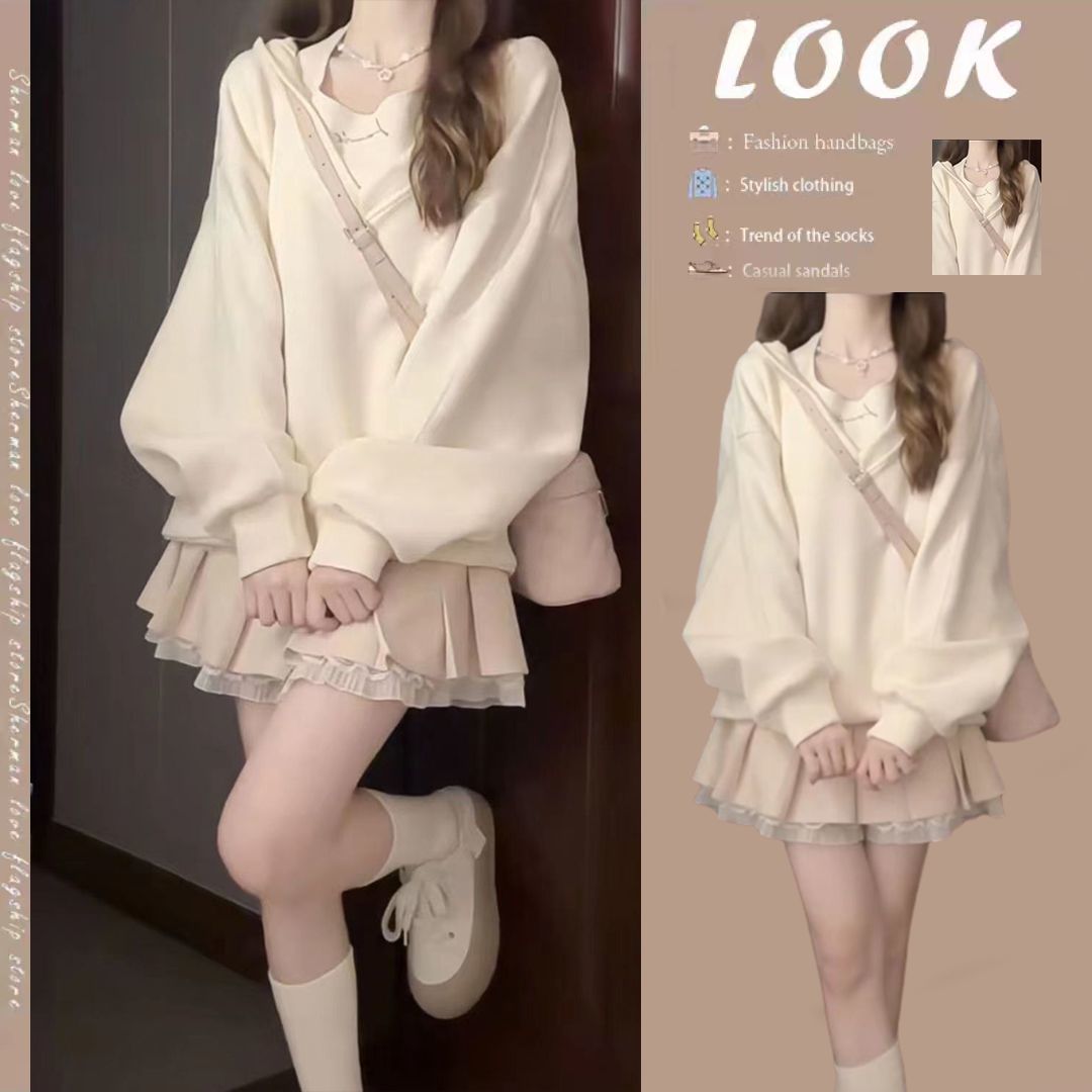 Autumn and winter suit for women, a complete set of high-end 2023 new versatile suspenders, loose sweatshirt, slimming skirt, three-piece set